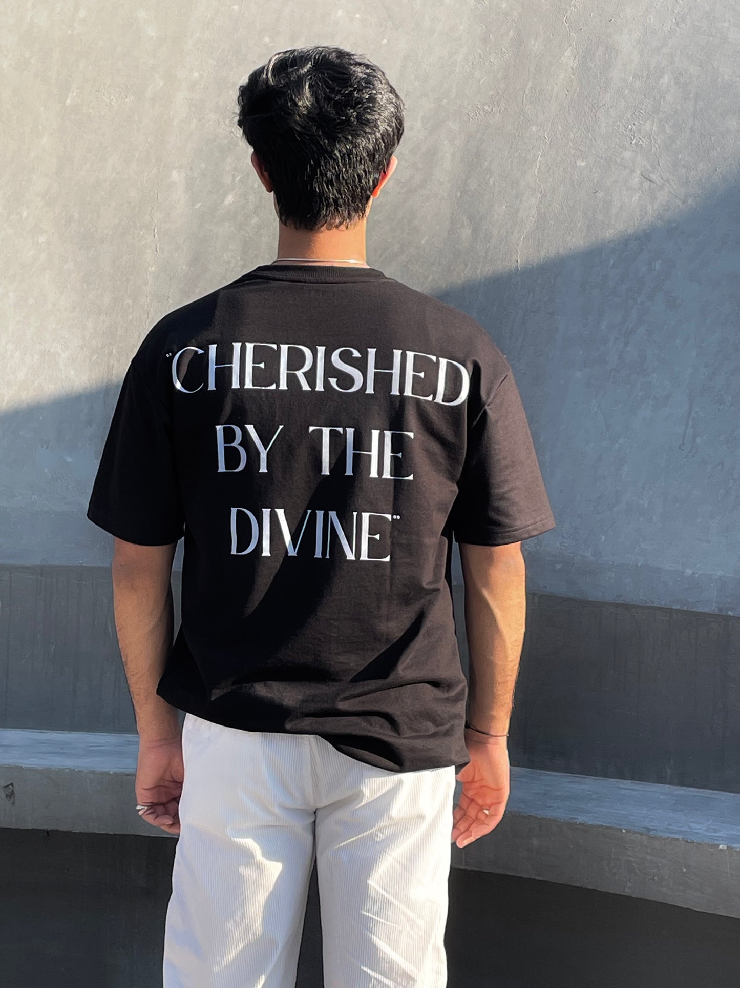 CHERISHED BY THE DIVINE TEE IN BLACK
